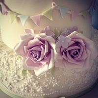 Vintage rose and bunting wedding cake