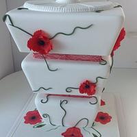 Upside Down Poppy Wedding Cake