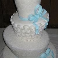 Topsy turvy winter sparkle wedding cake