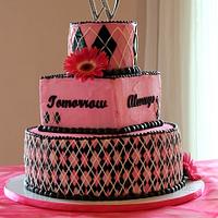Pink & Black wedding cake with a rainbow inside