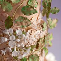 Gold textures with beech wreath and floral base