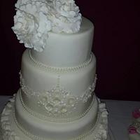 Ruffle and jewel wedding cake