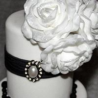 Sparkly white and black wedding cake