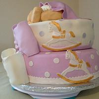 Baby butt cake with rocking horses