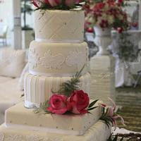 WHITE AND HOT PINK ILLUSION WEDDING CAKE
