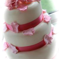 Three tier pretty in pink wedding cake