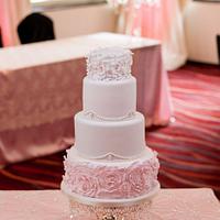 Pink ruffles and pearls wedding cake (with mini treat table)