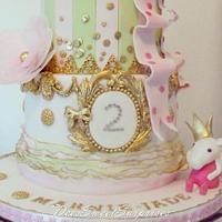2 tier Minnie and Peppa birthday cake