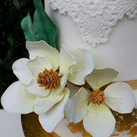 southern magnolia wedding cake 