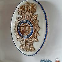 Royal icing police badge cookie