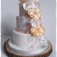 Wedding cake with silver feathers