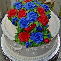 Vibrant Buttercream roses on 2-tier cake