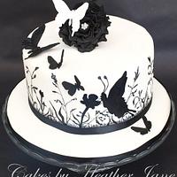Wildflowers and butterflies hand painted cake