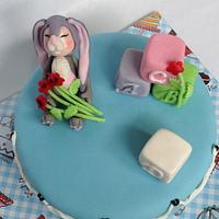 Birth cake with a baby in rabbitsuit