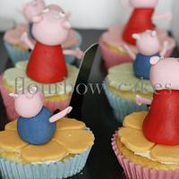 Peppa pig and George playing in a pool of mud and cupcakes
