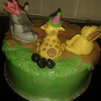 jungle themed cake elephant, giraffe & lion