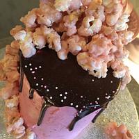 Pink popcorn drip cake