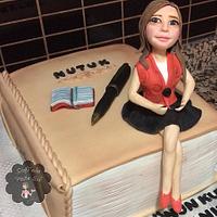 Teacher and book Cake