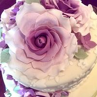 Rose and bunting wedding cake