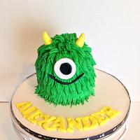Monsters first birthday cake