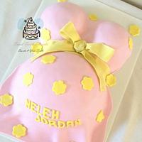 Pink and Yellow Baby Bump Baby Shower Cake