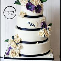 Ivory with touch of blue and purple wedding cake