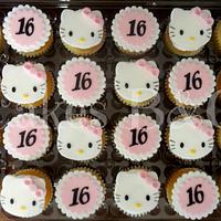Sweet 16 Hello Kitty cake and cupcakes 