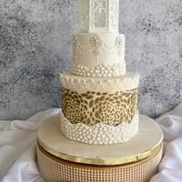 Gold and white wedding cake 