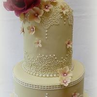 Lace and rose wedding cake