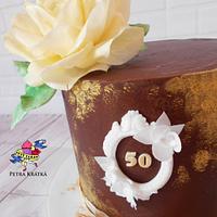 Chocolate cake with yellow rose
