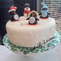 Christmas cake with penguins and snowman