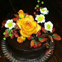 Chocolate cake with autumn flowers
