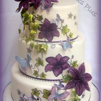 Lily and butterfly wedding cake