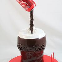A glass of Coke Cake