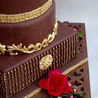 Chocolate and gold wedding cake