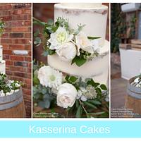 Semi-naked wedding cake with fresh flowers