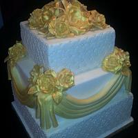 Gold grecian drape wedding cake
