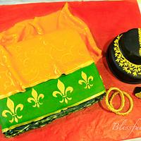 Traditional saree and gold accessories
