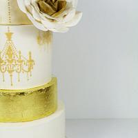  Gold leaf and Chandelier wedding cake
