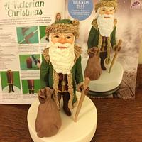 A Victorian Christmas modelled figure