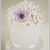 purple ombré rose wedding cake