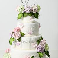 Wedding cake with hydrangeas and lace