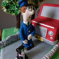 Postman Pat and his black and white cat.