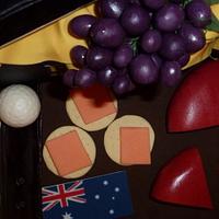 Luggage, golf, wine and cheese cake