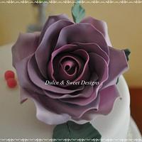 Purple rose wedding cake. 
