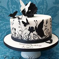 Wildflowers and butterflies hand painted cake