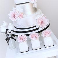 Vintage/shabby chic wedding cake with matching mini cakes and cake pops
