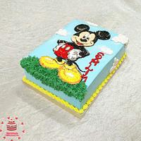 Piping Mickey mouse cake