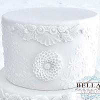 White on White Bas Relief Wedding Cake