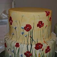 Painting cake with poppies
